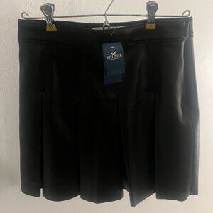 Black leather mini skirt